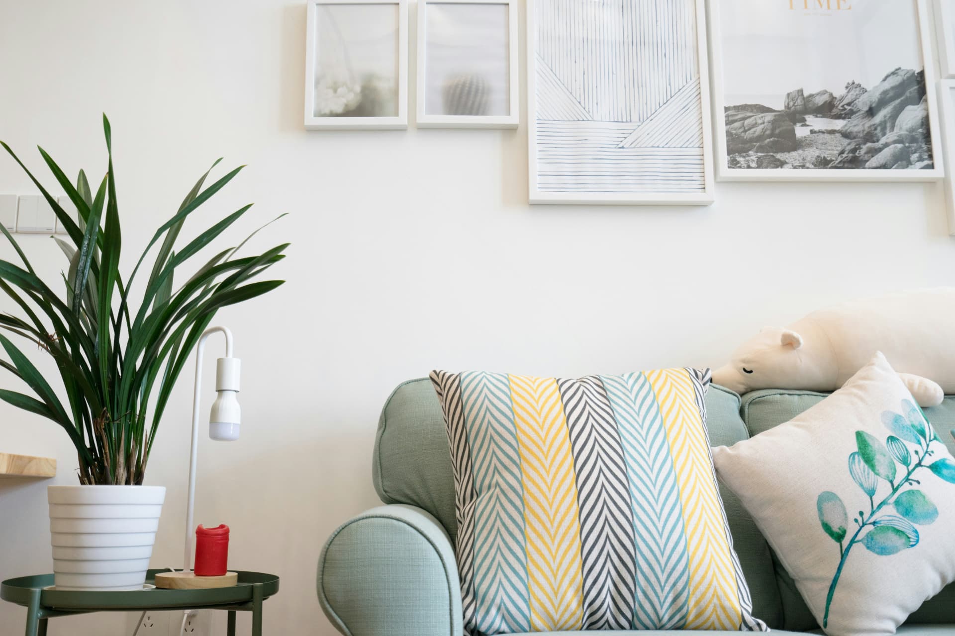 Living area with a gallery wall in a Nashville guest house short-term rental
