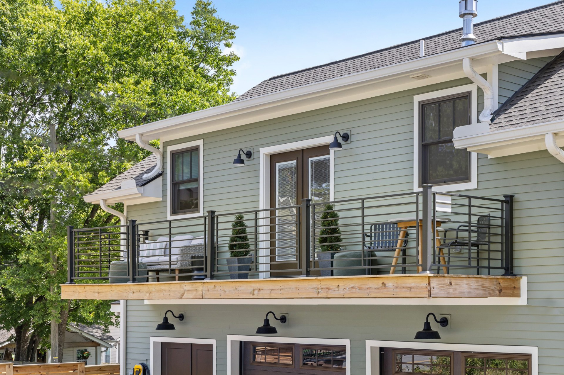 Balcony with seating at a Nashville DADU short-term rental managed by Rest Easy Nashville
